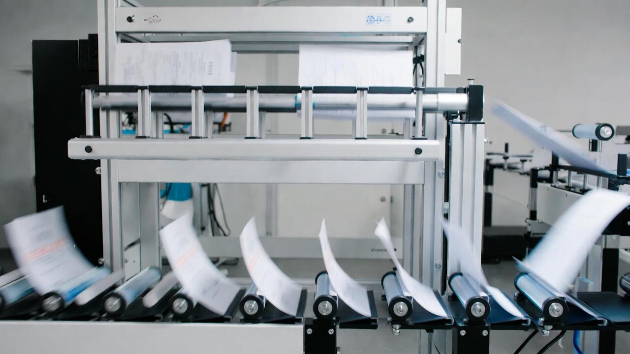 Documents flowing through an automated processing pipeline with stamps and tags